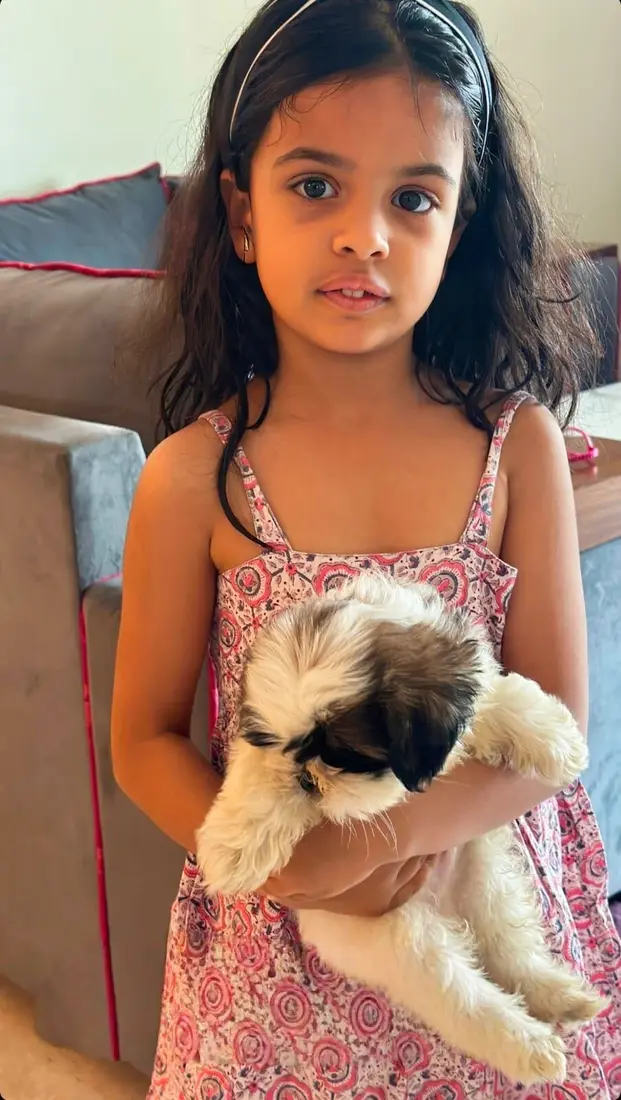 A FancyPaws puppy with its new family
