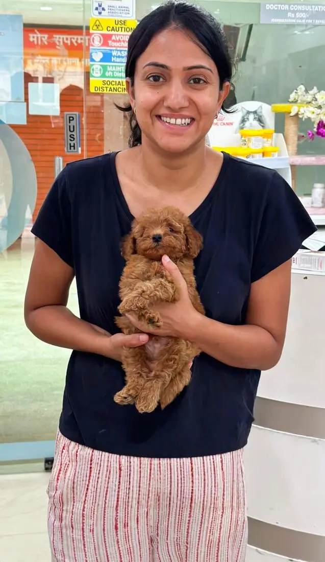 A FancyPaws puppy with its new family