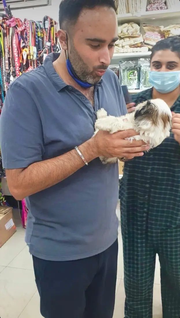 A FancyPaws puppy with its new family