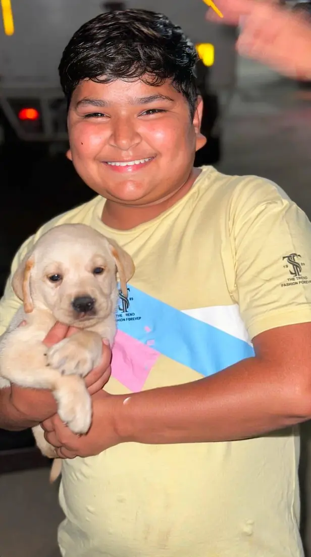 A FancyPaws puppy with its new family