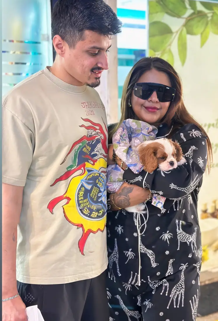 A FancyPaws puppy with its new family