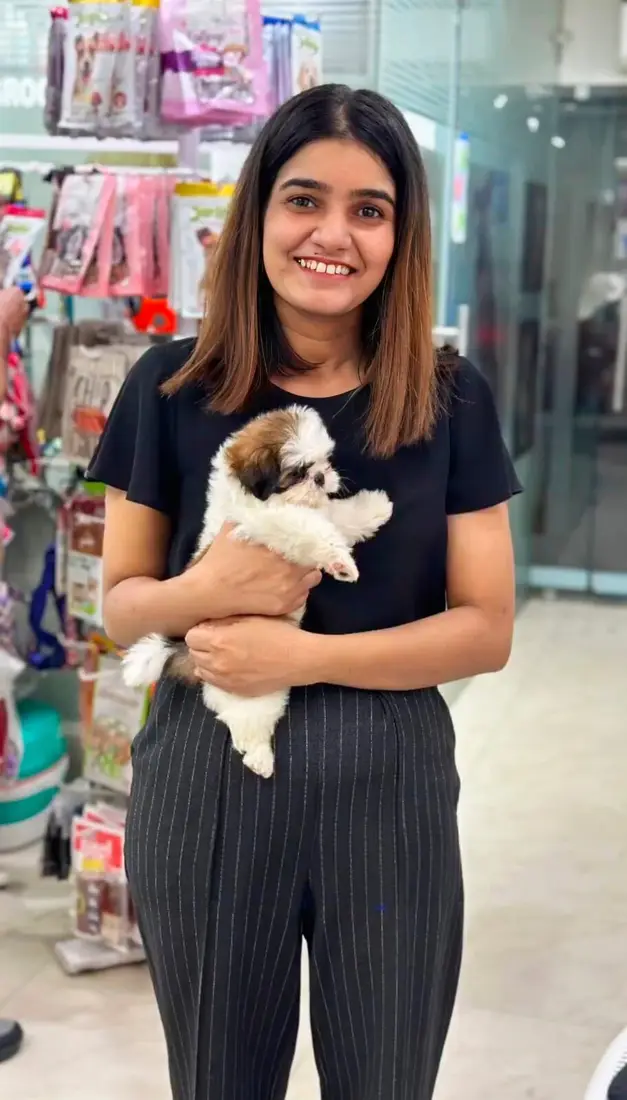 A FancyPaws puppy with its new family