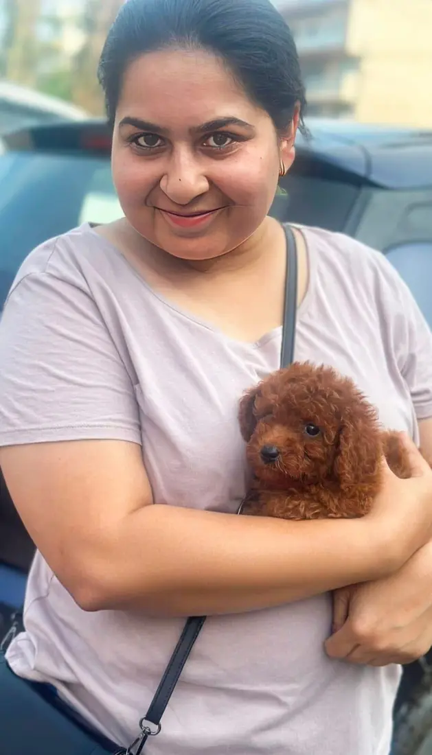 A FancyPaws puppy with its new family